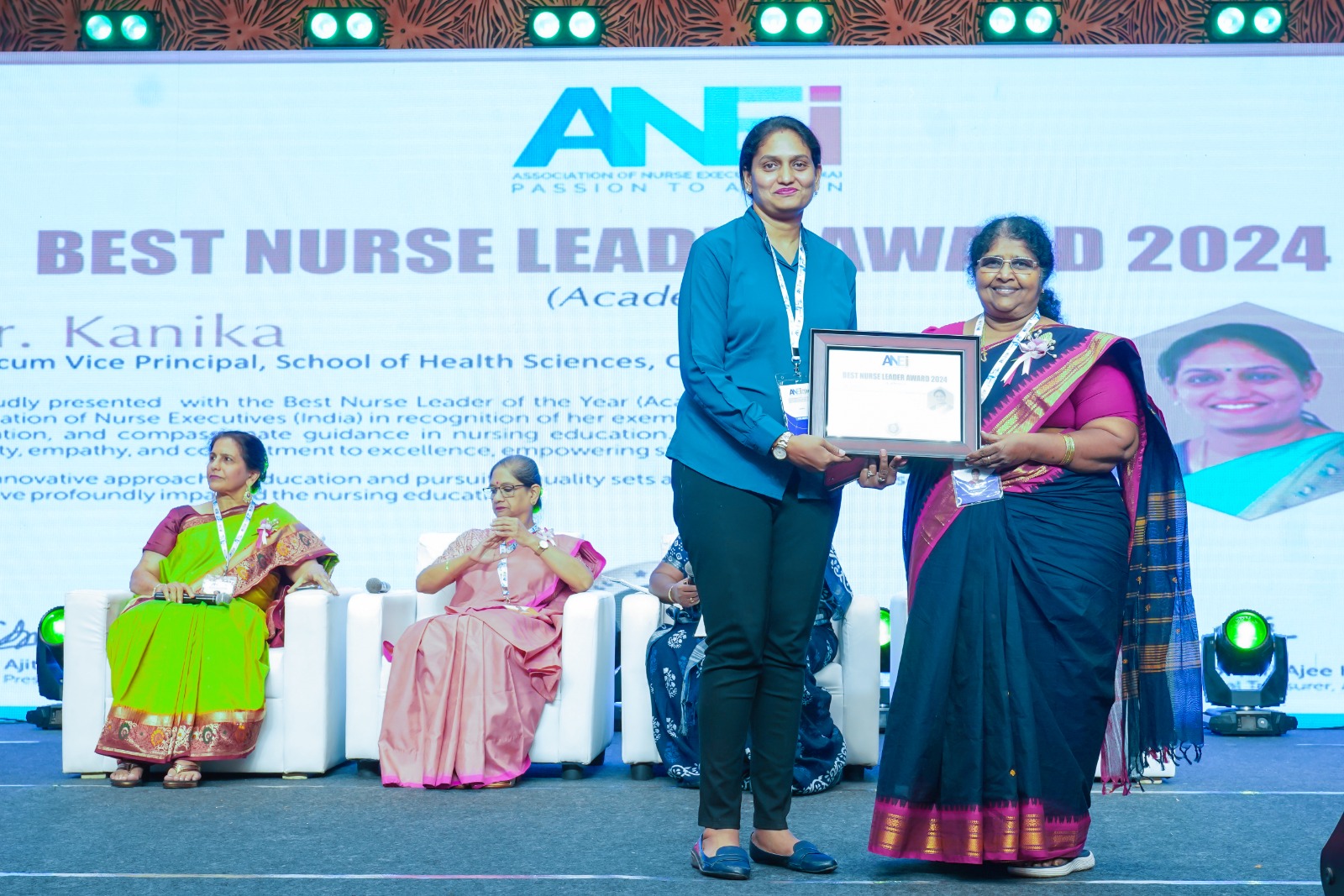 Dr. Kanika Rai receiving the Best Nurse Leader Award 2024