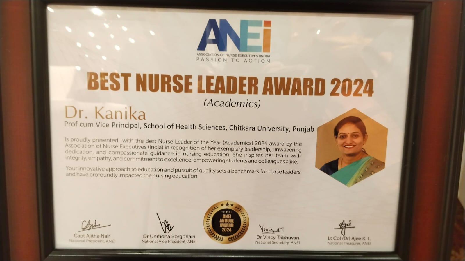 Best Nurse Leader Award certificate presented to Dr. Kanika Rai